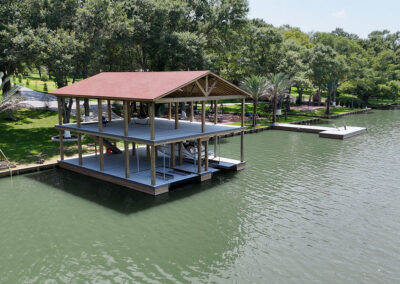 Two Story Boat House Lake Conroe and Lake Livingston from The Boat Lift, Dock and Bulkhead Company