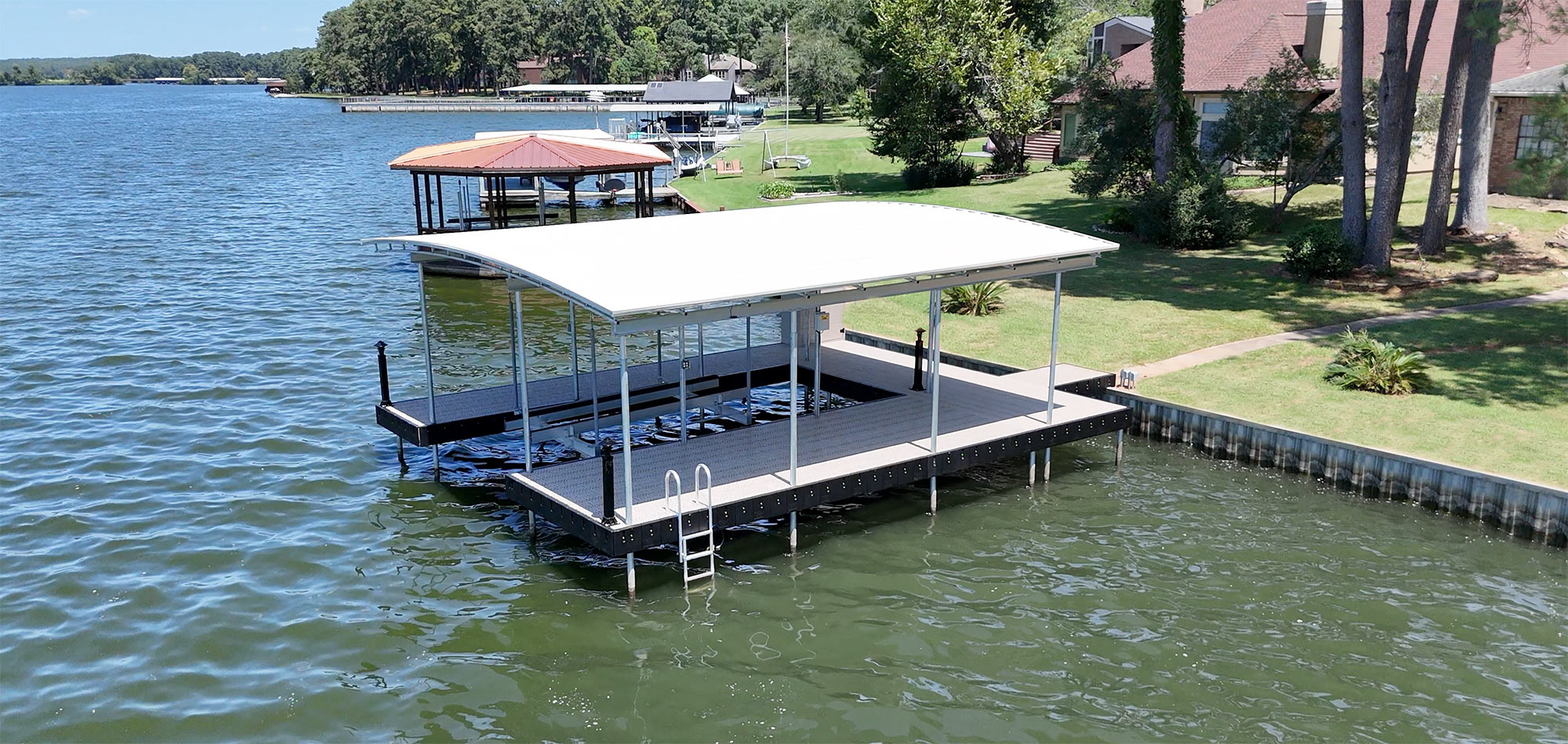 Lake-Conroe-Construction-Nguyen-Bikini-Top-Boat-and-Dock-Cover-Lake-Conroe Two Story Boat House Lake Conroe and Lake Livingston from The Boat Lift, Dock and Bulkhead Company